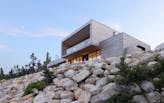 Coastal Nova Scotia home ‘emerges from rocky terrain,’ designed by Omar Gandhi Architects