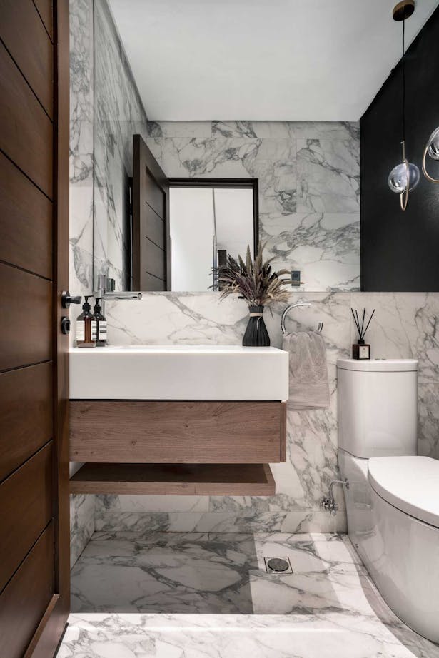 elegant white powder room design with the use of marble and wood