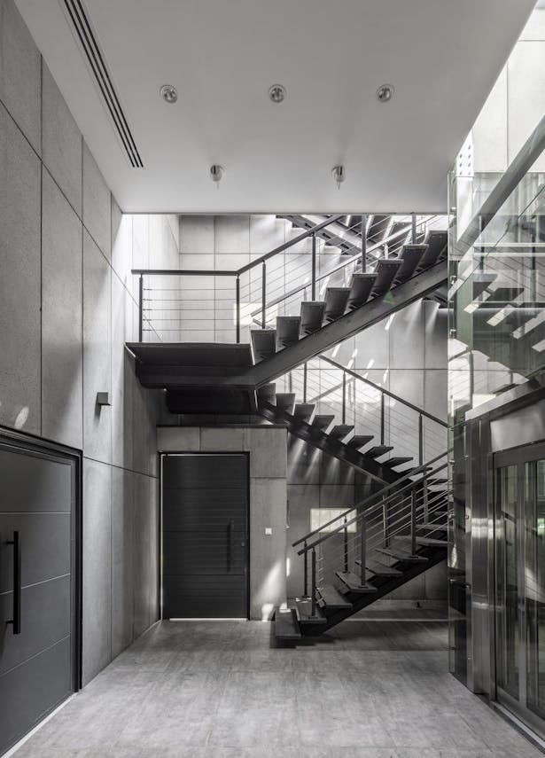 Stairs and elevator in basement (photography: Parham Taghioff)