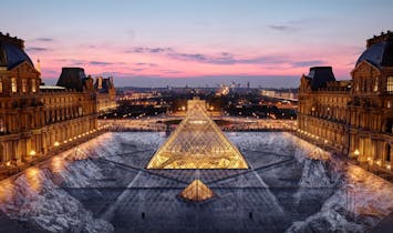 For its 30th birthday, Artist JR creates a large-scale optical illusion at the Louvre Pyramid