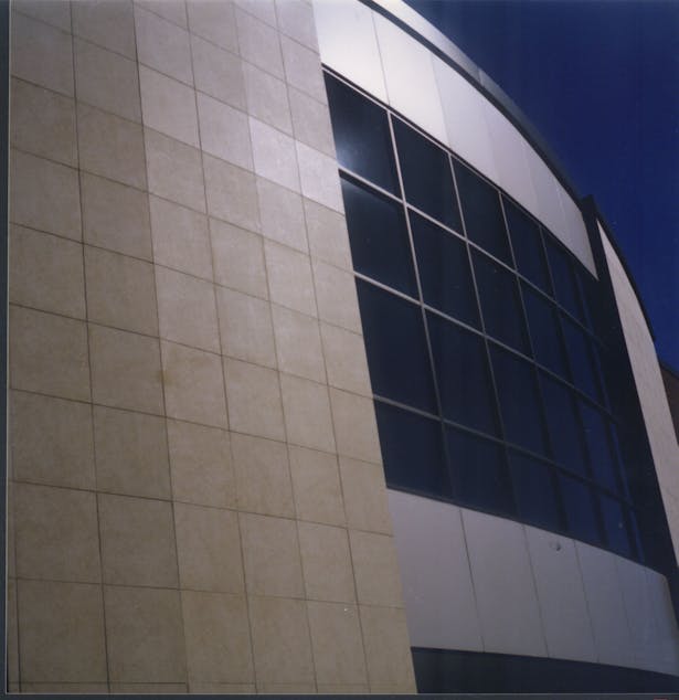Glazing andStone Tile Entrance