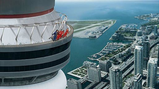 This artist's rendition shows the CN Tower's new EdgeWalk attraction. Set to open Aug. 1, it will allow visitors to walk outside the tower while being restrained by an overhead harness. (Canadian Press)