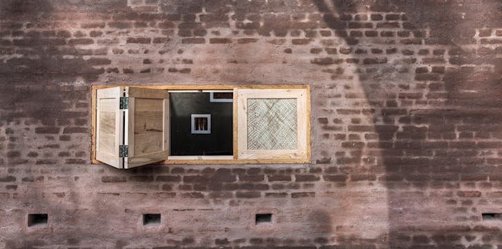 Handmade window from cinnamon wood (Photo: Pasi Aalto / pasiaalto.com)