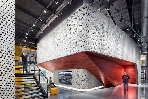 Pratt Institute’s Film/Video Department Building features interior spaces that are wrapped in a perforated metal-panel structure created by Pratt Institute School of Architecture alumnus and faculty member Haresh Lalvani. The work is titled Origins (2014). Photo credit: Alexander Severin...