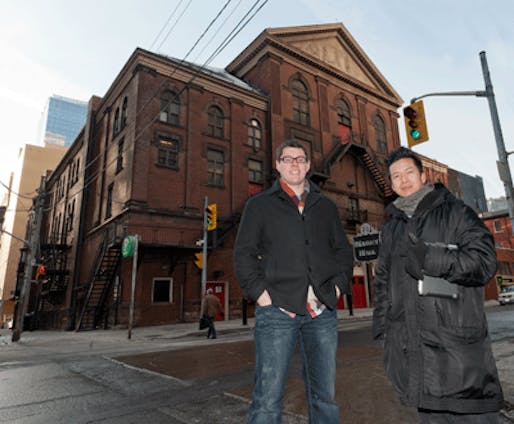 Innovative Technologies librarian Graham McCarthy (left) and Architectural Science professor Vincent Hui in front of Massey Hall, one of the 93 buildings included in the database of a new architecture app developed by the pair.