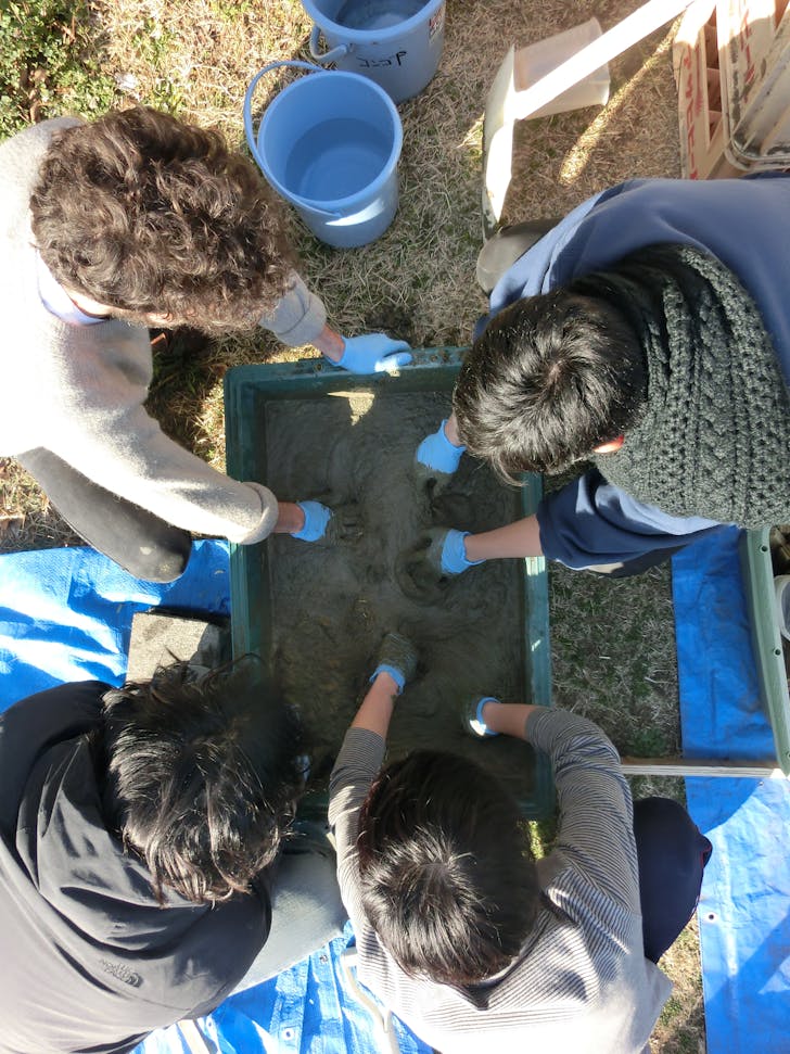 Testing concrete mixes at the Keio workshop. Courtesy of Bill Galloway.