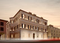 IOSA GHINI ASSOCIATI DESIGNS THE FIRST DESIGN CLUB REAL ESTATE BUILDING IN BOLOGNA, ITALY
