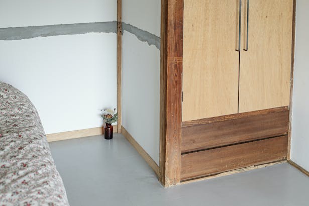 The previous in-wall closet is now accommodating the bed structure on the 1st floor
