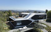 Arshia Architects completes Bel Air residence inspired by ‘streamline automotive design’
