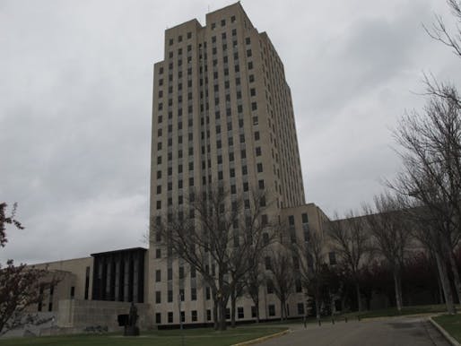 (Dale Wetzel/ Associated Press ) - This photo, taken Thursday, April 19, 2012, shows the North Dakota Capitol, whose main tower is almost 250 feet high. The Republican majority leader of the Minnesota House on Thursday described the North Dakota Capitol building, which is located in Bismarck, N.D., as “embarrassing” and compared it to an insurance office. His remarks came during debate in the Minnesota Legislature in St. Paul, Minn., about whether to set aside money for repairs to the...