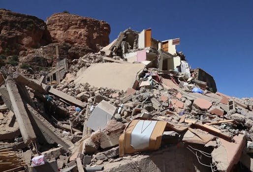Flattened structures in Imi N'Tala, Morocco, destroyed during the recent Marrakesh-Safi earthquake. Image courtesy alyaoum24 via Wikimedia Commons (<a href="https://commons.wikimedia.org/wiki/File:Earthquake_impact_in_Imi_N%27Tala_08.jpg">CC BY 3.0</a>)