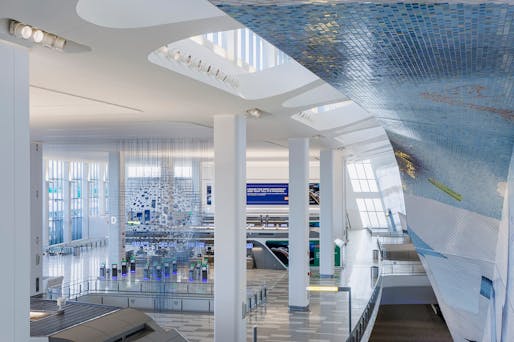 Interior view of <a href="https://archinect.com/news/article/150202857/another-look-at-hok-s-new-la-guardia-airport-terminal">HOK's new La Guardia Airport terminal</a>. Image courtesy of LaGuardia Gateway Partners.