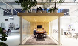 A garden is the roof of a meeting room in a loft office by jvantspijker