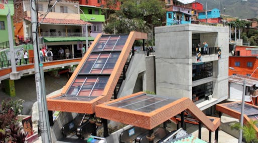 The escalators in Medellín's Comuna 13 have become a tourist attraction for international urbanists. Locals seem glad to have the visitors (Christopher Swope/Citiscope)