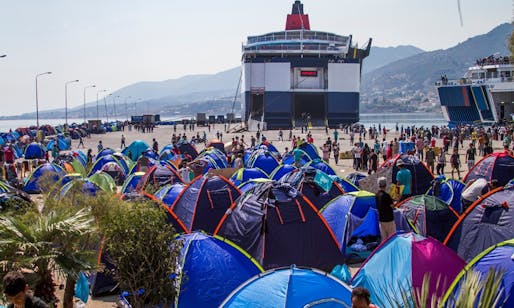 Tents line the main port in Lesbos, as migrants await transfer to the Greek mainland. Photograph: Tyler Jump/International Rescue Committee. Image via the guardian.com.