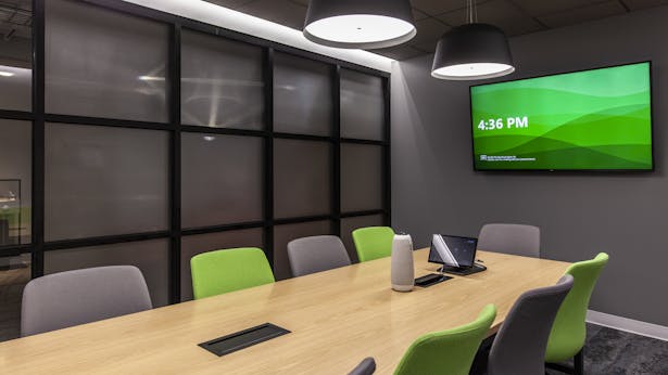 Conference room with privacy glass and felt walls.