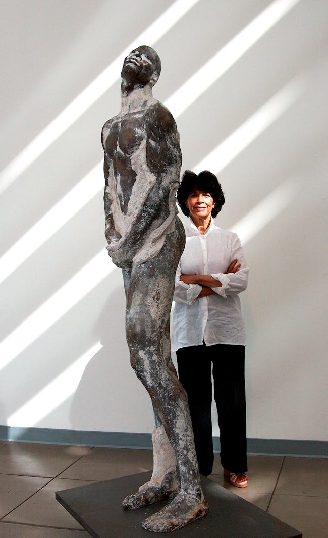 Artis Lane with her work Emerging First Man, courtesy of the artist and the California African American Museum