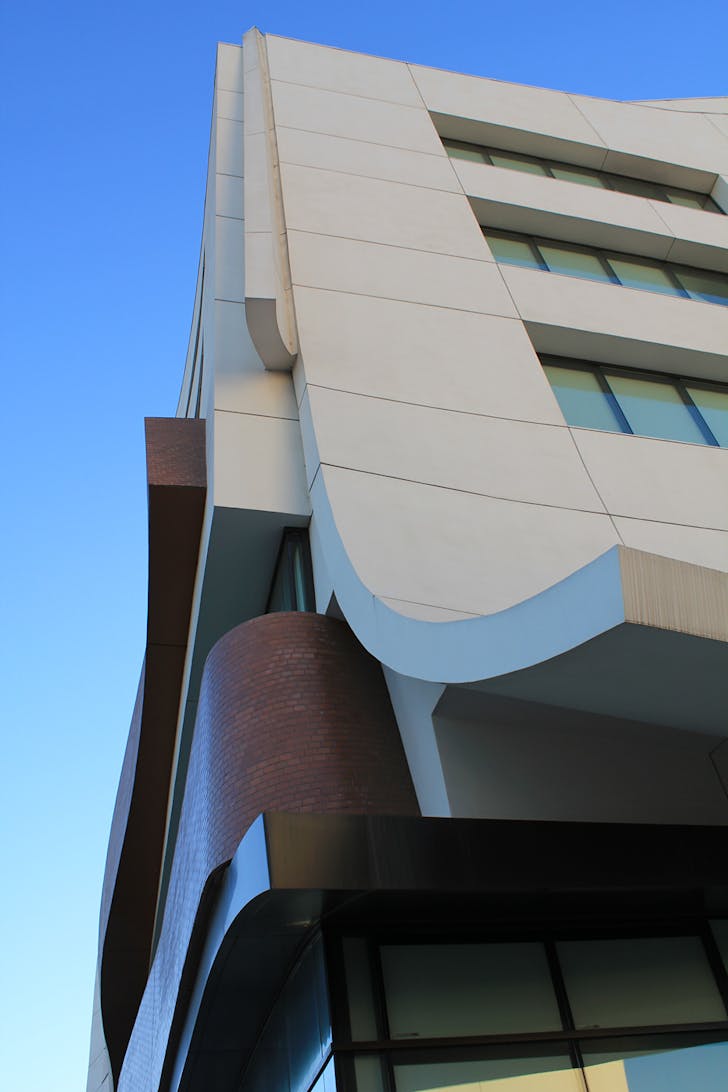 Image of the corner and decorative detail on the new South Tower at Trade Tech. Image © 2013 Al-Insan B. Lashley Design.