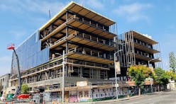 Glass curtain wall begins to wrap around LEVER Architecture's hybrid mass timber building in Los Angeles
