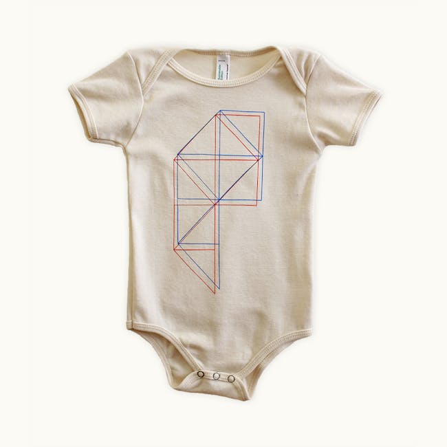 GEOMETRIE 001 onesie by Tiny Modernism. Available in infant sizes 3-6 months, 6-12 months and 12-18 months..