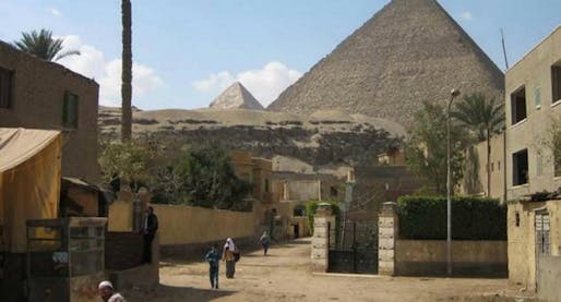 Settlement with the Great Pyramid of Giza in the background. (Image via thisbigcity.net)