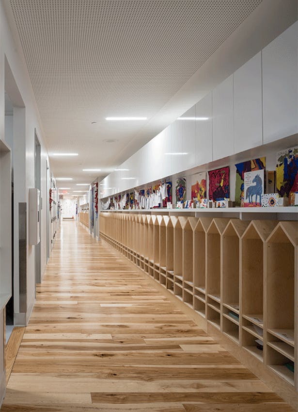 Hallways feature open concept cubbies with plenty of space for displaying books and Art.