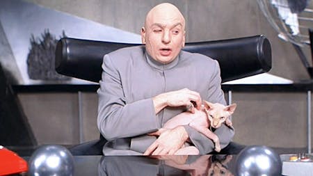 Ridiculous, overstuffed, unfashionably retro: Dr. Evil and his chair. Image via filmandfurniture.com.