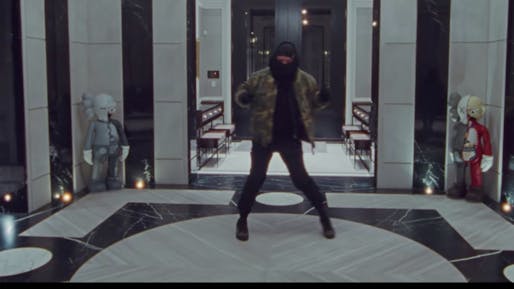 Drake demonstrating the Toosie Slide technique in his 2020 music video via YouTube 