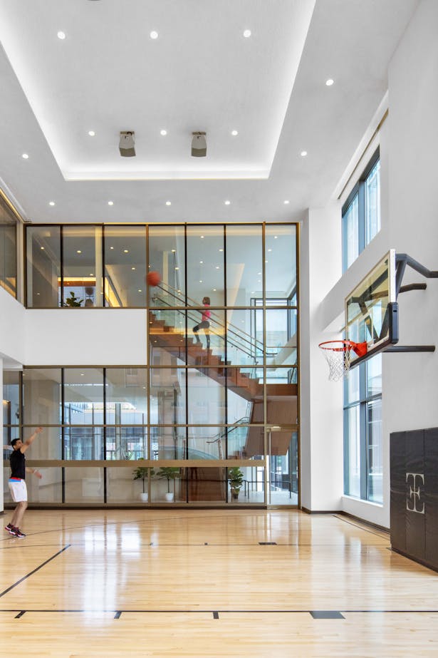 Fitness center with an indoor basketball court, Eric Laignel