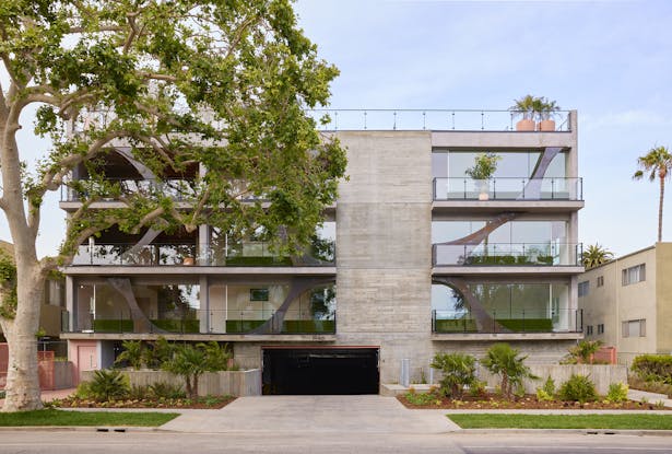 A nature-centric LEED Gold apartment building that engages the site's 90-year-old sycamore and animates the street in West LA.