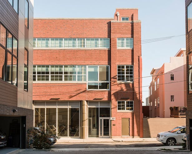 Originally built in 1948, the former factory blends the International style popular in post-war industrial buildings with Philadelphia's traditional brick palette. | © Chris Leaman