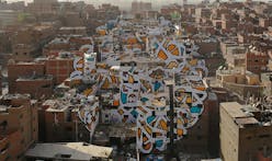 Giant "calligraffiti" mural unites community in Cairo slum