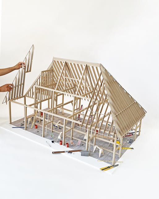 Besler & Sons - Barn Raising, 2022. Printed paper. 36 x 36 x 59 inches. Project team: Erin Besler, Ian Besler, Michael Lee, Barrington Calvert, Joey Guadagno, Shirley Chen, Priscilla Zhang, Chase Galis, Dongxiao Cheng. Image © Shirley Chen. Image courtesy of The Cooper Union.
