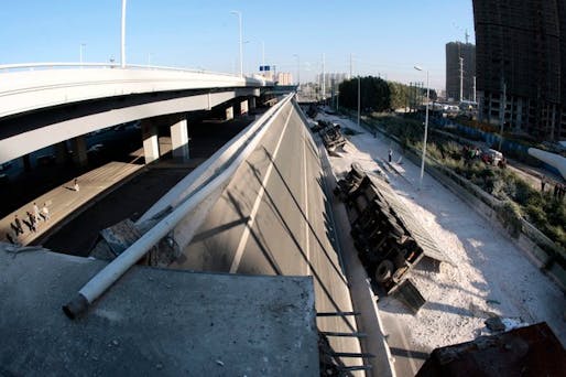 A collapsed section of the Yangmingtan Bridge's ramp, in the city of Harbin, dropped 100 feet to the ground on Friday, killing three people and injuring five. (Photo: CHINATOPIX, via Associated Press)