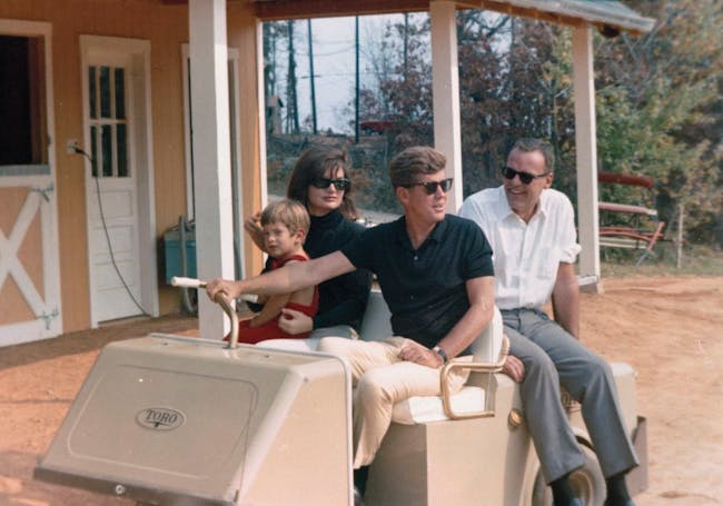 President John F. Kennedy in Golf Cart in Atoka, Virginia; courtesy: Cecil Stoughton/White House Photographs/ John F. Kennedy Presidential Library and Museum, Boston.