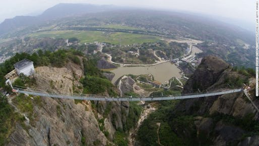 Originally made of wood, the bridge in China's Shiniuzhai National Geological Park has been converted to a glass walkway to attract a growing crowd of thrill seekers. (Image via cnn.com)