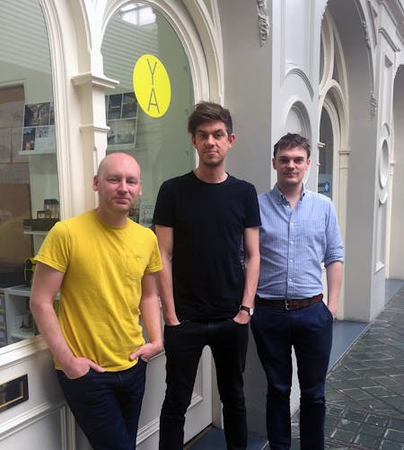 Founders Simon Graham and Jonathan Duffett with new recruit Tom outside their office.