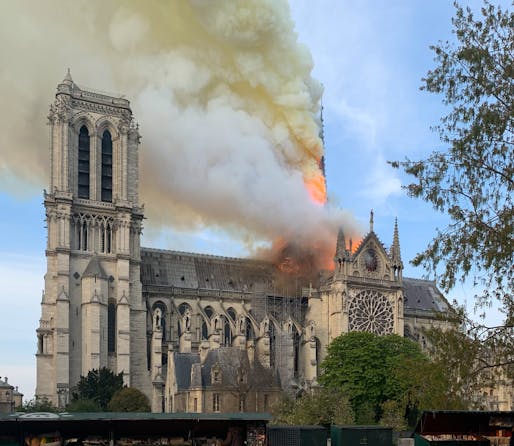Notre Dame Cathedral's spire engulfed in flames in the evening hours of April 15, 2019. Image: Wandrille de Préville/Wikipedia.