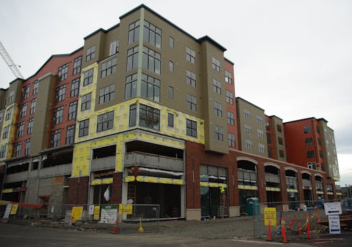 A typical '5-over-1' mixed-use development under construction in Hillsboro, Oregon. Image courtesy of Wikimedia Commons user M.O. Stevens. (CC BY-SA 4.0) 
