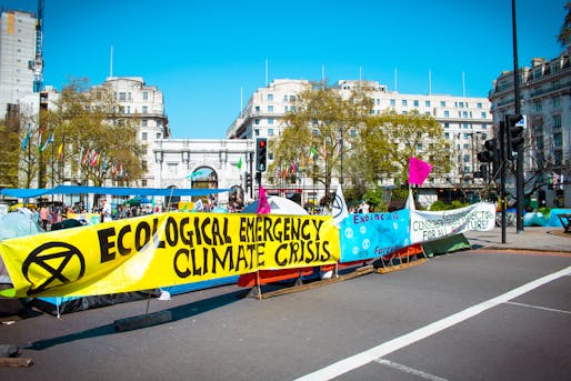 Extinction Rebellion protesters demonstrating for climate action at an April 20th, 2019 rally in London. Image courtesy Wikimedia Commons user Alexander Savin. (CC BY 2.0)