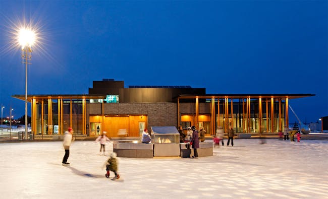 Skating rink with fire place in front of the Water Garden Pavilion