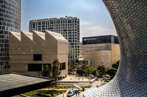 A view of the Museo Jumex from the Museo Soumaya. Credit Adriana Zehbrauskas for The New York Times