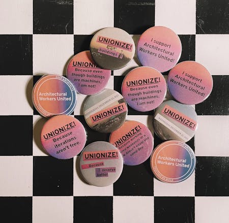 Unionization pins from the Architectural Workers United. Instagram post from January 9, 2022 posted by @architectural.workers.united
