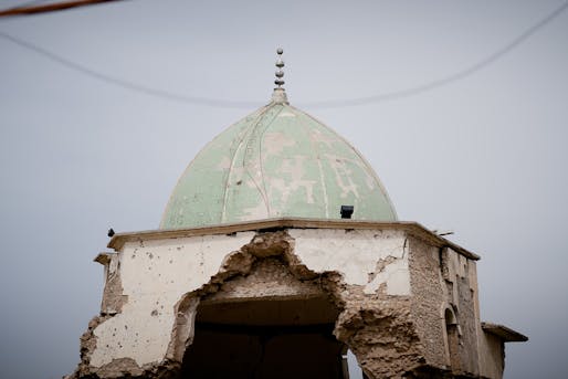 The damaged minaret as it appeared in 2019. Image courtesy Wikimedia Commons user Levi Clancy.