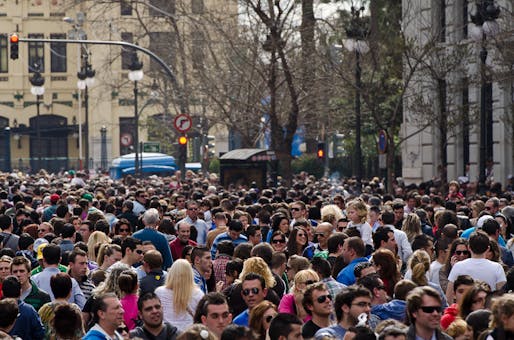 Crowded city street in Valencia, Spain. Image © Marc Sardon