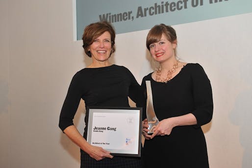 Jeanne Gang receives the award from Christine Murray, editor of The Architectural Review. Image via architectural-review.com.
