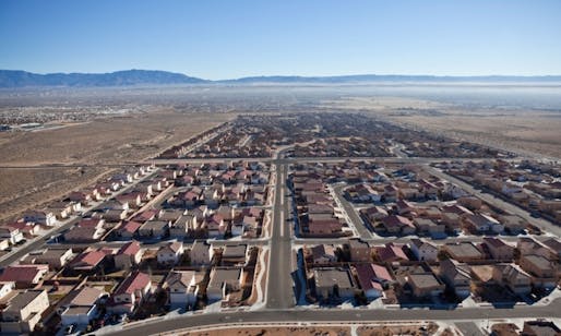 One of the existing suburban developments in the desert outside Albuquerque; beyond the city limits, land is cheaper and taxes are lower. Photograph: Trekshots/Alamy, image via theguardian.com.