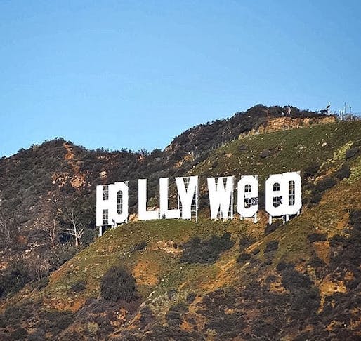 For a few hours on New Year's Day 2017, the iconic Hollywood sign was briefly defaced with tarps to read 'Hollyweed.' Image: abc7la via Instagram