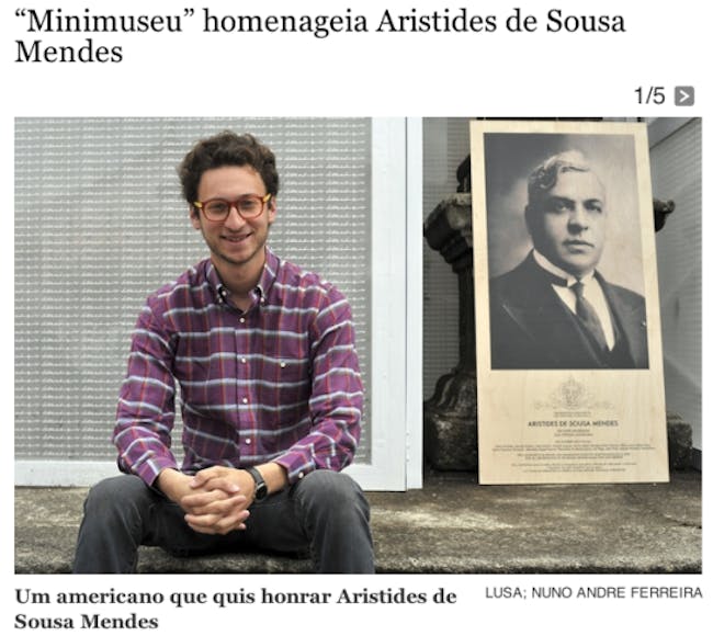 Eric Moed, the creator of Work Towards Fairness, next to a photo of Aristides de Sousa Mendes featured on Portugal's LUSA.