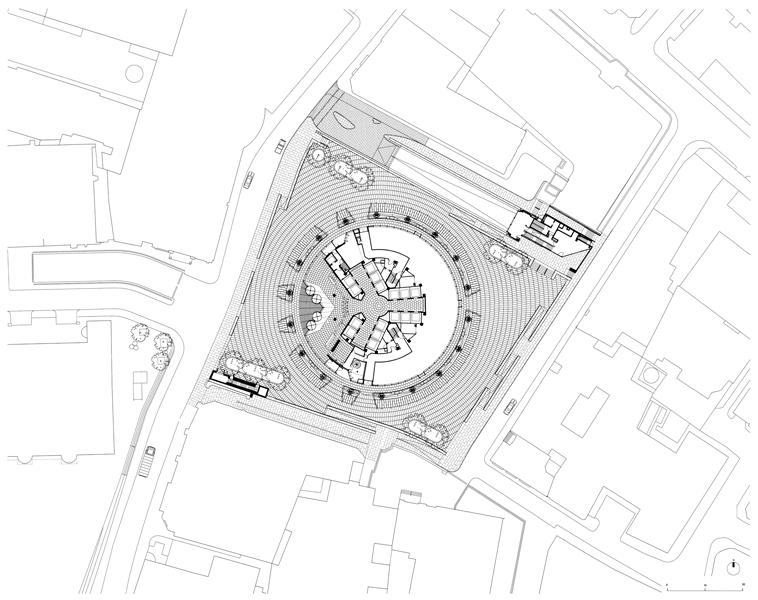 This site plan showing the plaza and context of 30 St Mary Axe includes the ground floors of both the tower and the Bury Street annex building at the east end of the ramp leading down into the below-grade parking deck. Courtesy of Foster + Partners.